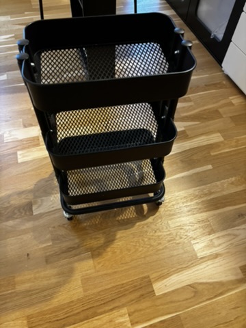 Black rolling utility cart